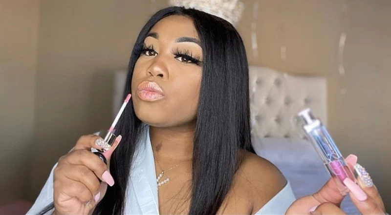 Mani J filming a lip gloss UGC video